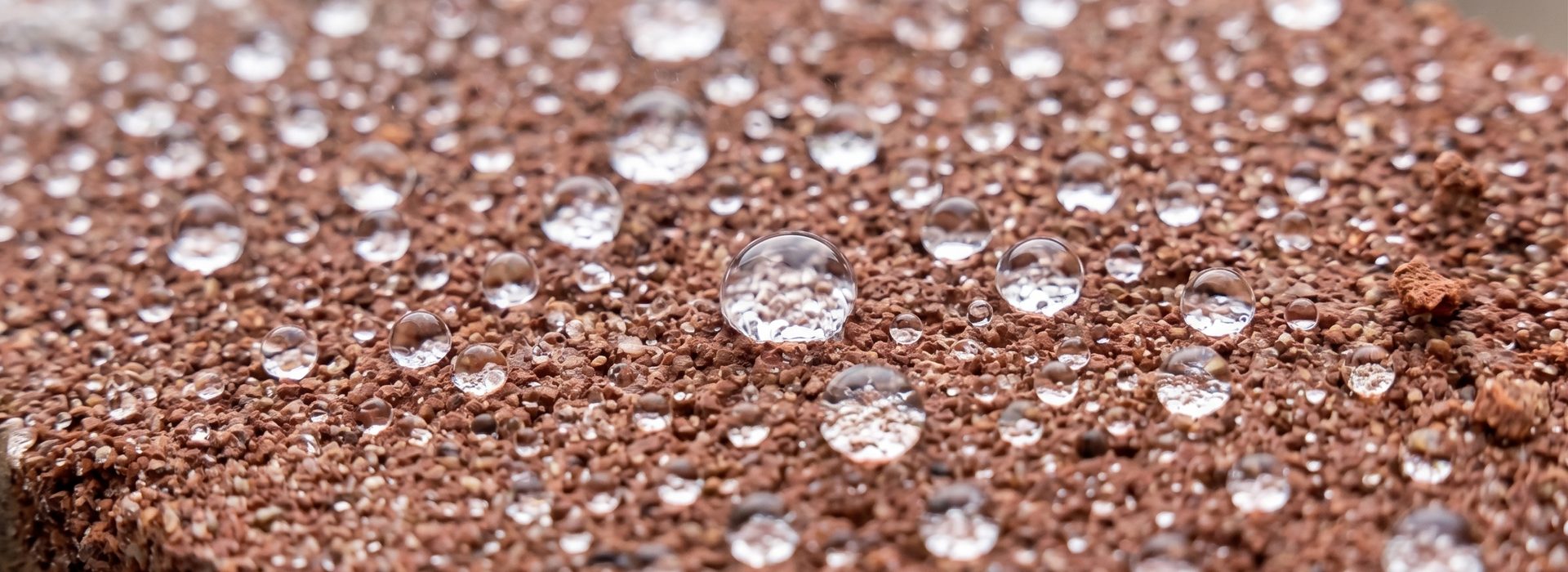 Breathable water-repellent treatment on brickwork - water beads on the surface while the masonry still breathes, preventing damp and frost damage.