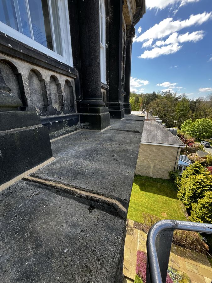Cornice repointing on a Grade II listed converted Victorian bath house in Ilkley - lime mortar specified for the heritage substrate.