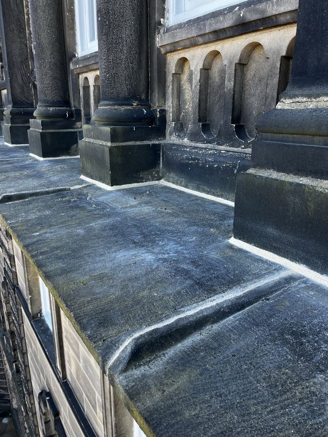 Cornice and string course repointing on a Grade II listed Victorian bath house in Ilkley - heritage-appropriate lime mortar.