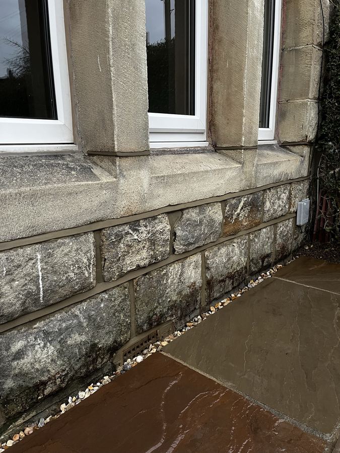 Front elevation repointing on a Yorkshire stone terrace house in Otley - full elevation restored to stop water ingress.