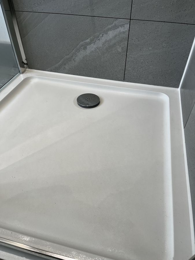 Shower tray sealant replacement in Harrogate - full bead removal and reseal to stop leaks and mould.